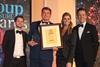 Ben Delahunty from Group Line and Anton Du Beke and Erin Boag presenting the Excellence Award to Oliver Williams from Isle of Wight Tours last October.