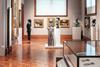 A woman studies a portrait in the new Blavatnik Wing at the National Portrait Gallery in London.